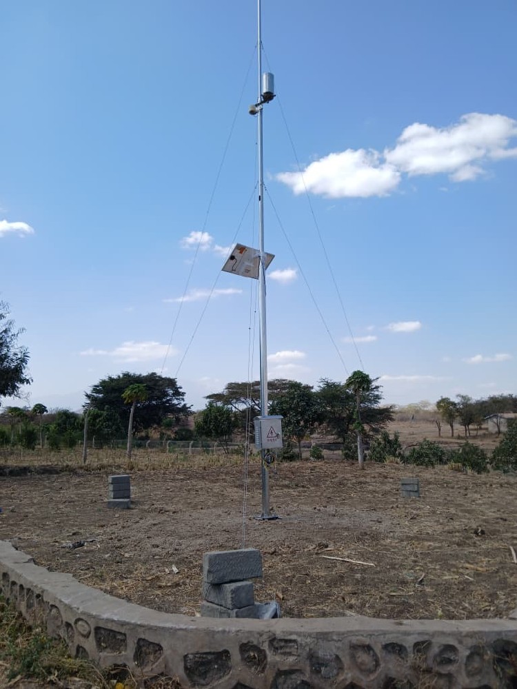 NiuBoL 10-meter research weather station installed at an outdoor site in Tanzania